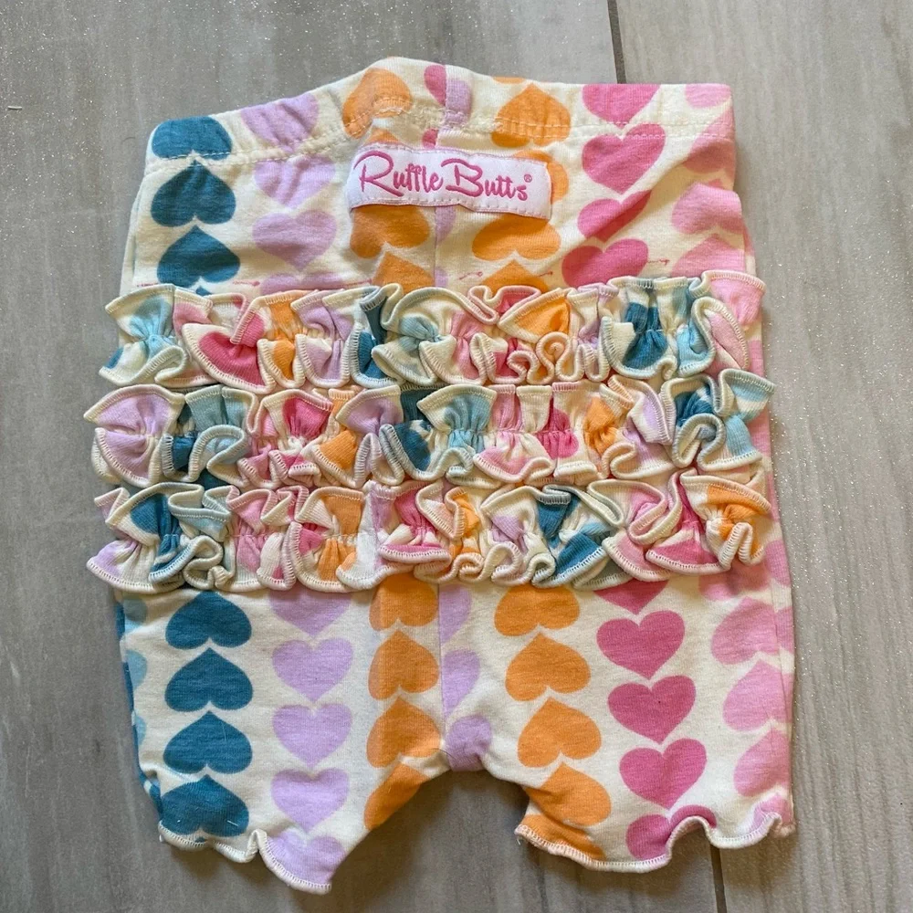 NWT RuffleButts Rainbow Heart Snuggly 2-Piece Ruffled Short Sleeve Pajamas, 0-3M
